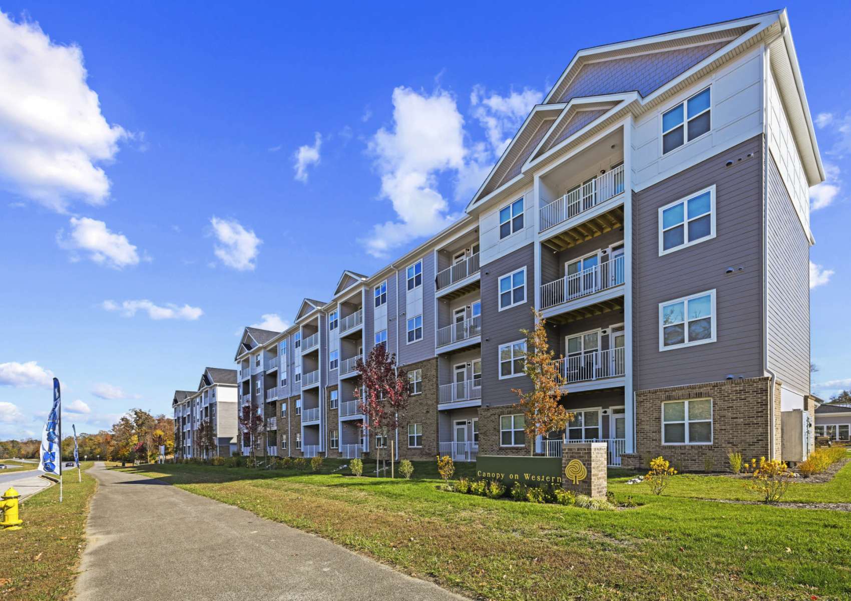 Exterior view of apartments at Canopy on Western in Waldorf, Maryland