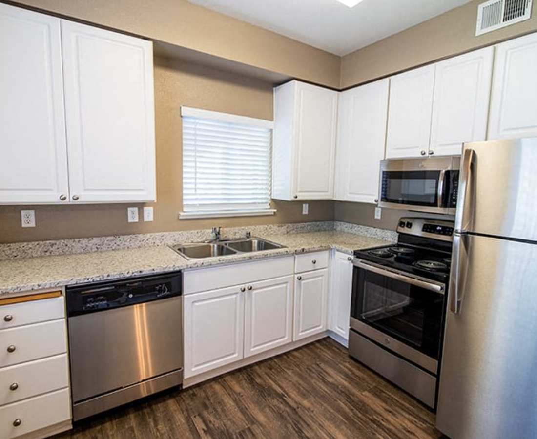 Kitchen with wood-style floors at  Sterling Ranch in El Dorado Hills, California