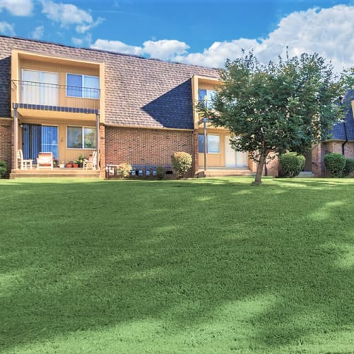 View of grass area at Patrician Terrace Apartment Homes in Jackson, Tennessee