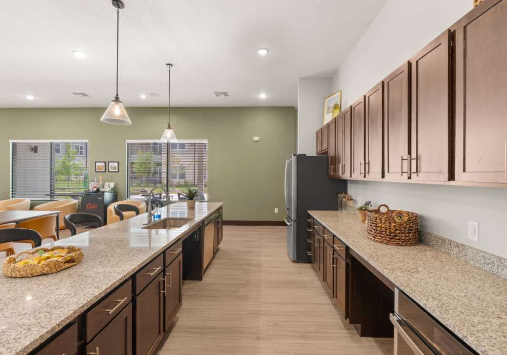 Clubhouse kitchen and gathering space at Walnut Springs in Seguin, Texas