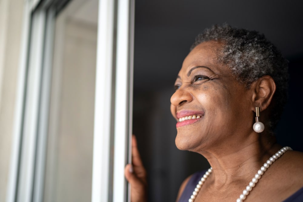 Smiling resident at Windsor Court Senior Living in Weatherford, Texas
