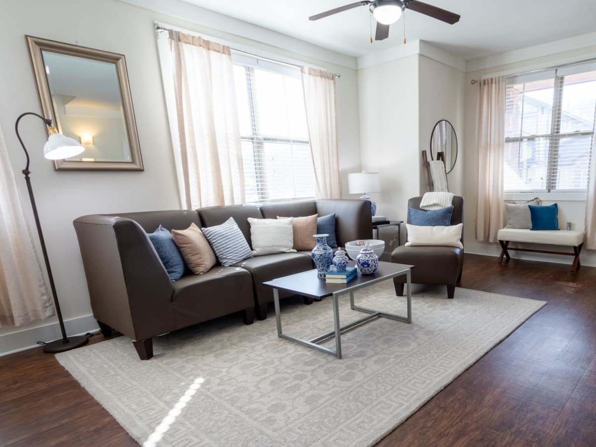 Beautiful model living room in a student apartment at The Waverly in Newark, Delaware