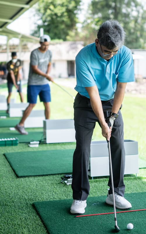 Resident golfing near Regency Village at Bend in Bend, Oregon