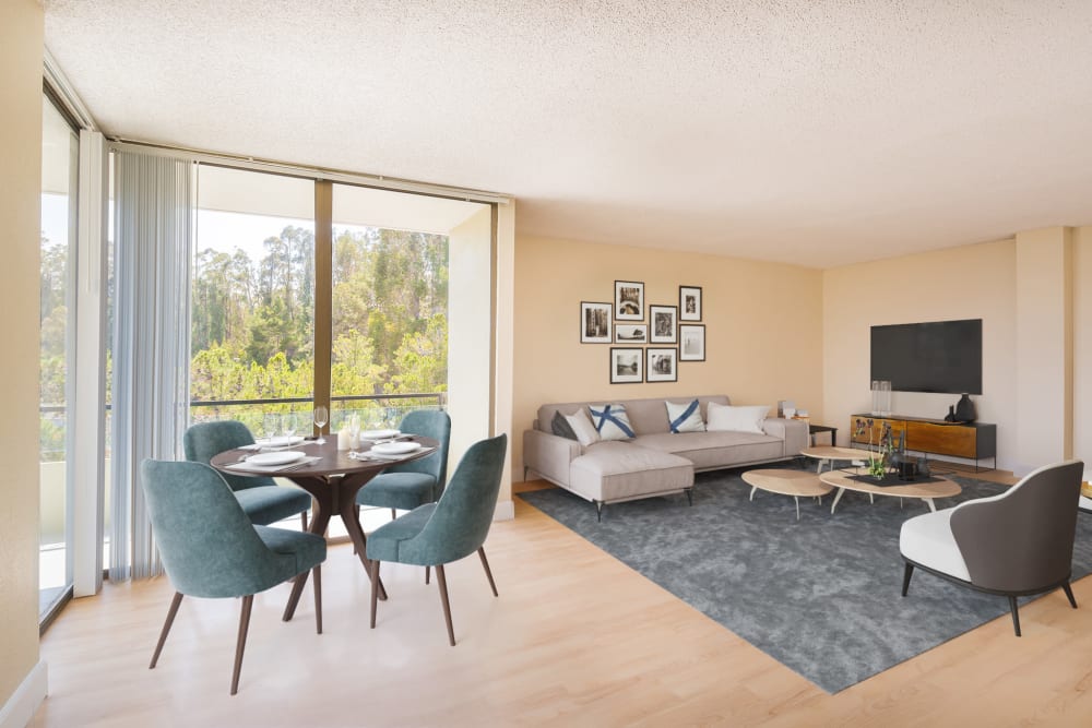 Large windows in living room at Skyline Terrace Apartments in Burlingame, California