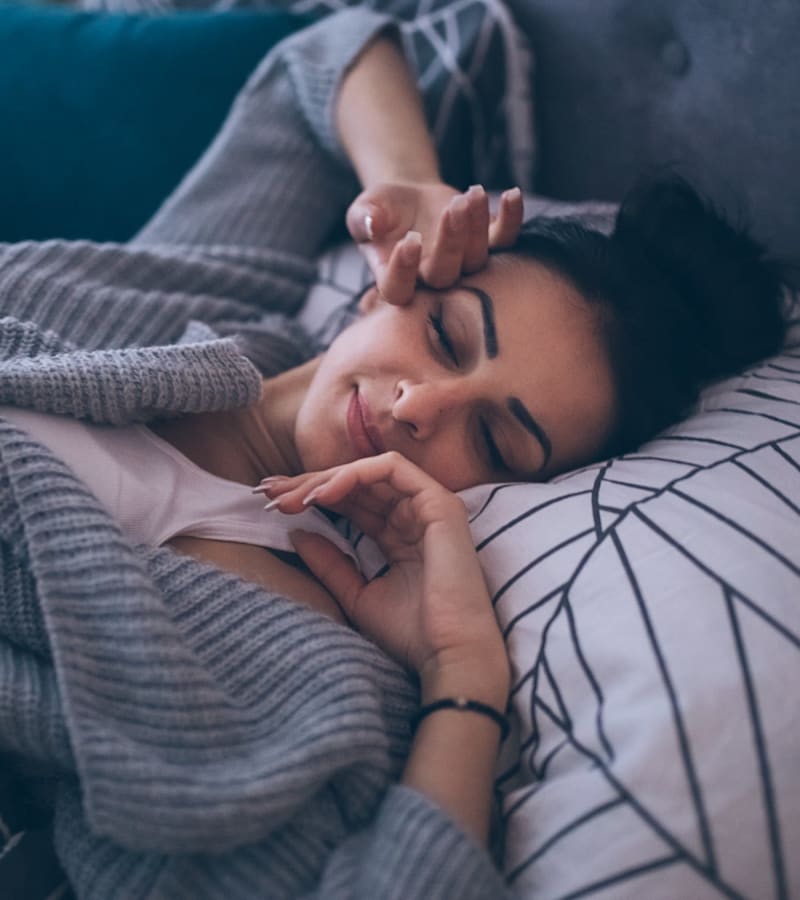 Resident sleeping in at The George New Brunswick in New Brunswick, New Jersey