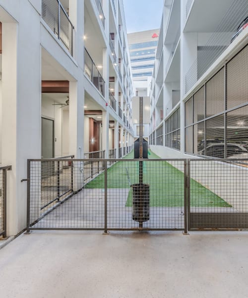 Greenspace in between parking area and buildings at Anthem Cityline in Richardson, Texas