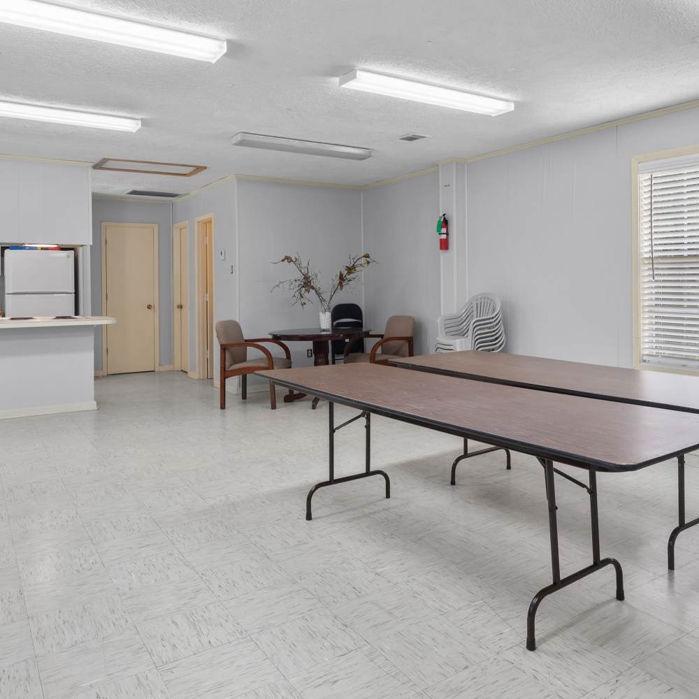 Spacious communal area with flexible seating and a welcoming atmosphere at Pecan Ridge in Vicksburg, Mississippi.