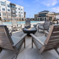 Seating around the firepit by the pool at The Station at Clift Farm in Madison, Alabama