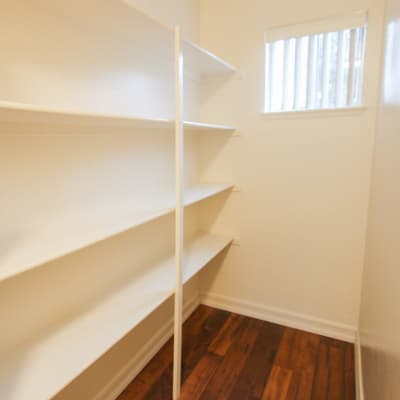 A walk-in closet with shelving at Lofgren Terrace in Chula Vista, California