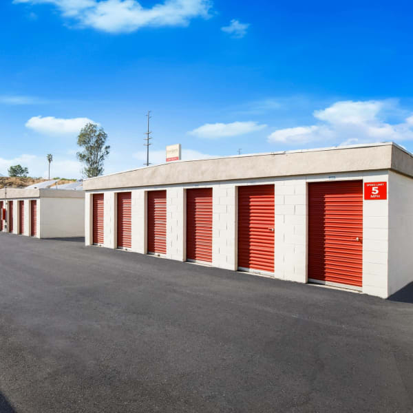 Outdoor storage units with drive-up access at StorQuest Self Storage in Loma Linda, California