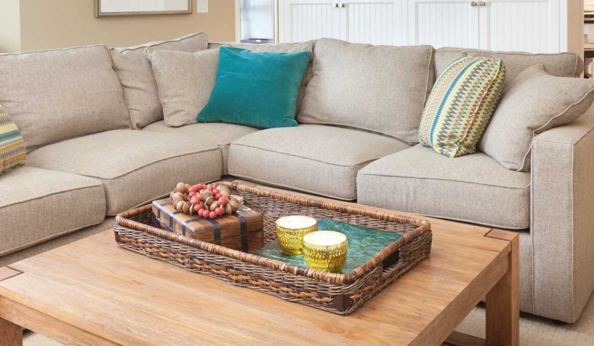 Apartment living room with sectional sofa at Miranda Crossing in Washington Township, Pennsylvania