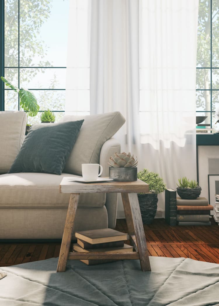 Sofa and end table in a living room with natural light at THE RESIDENCES AT LANDON RIDGE, San Antonio, Texas