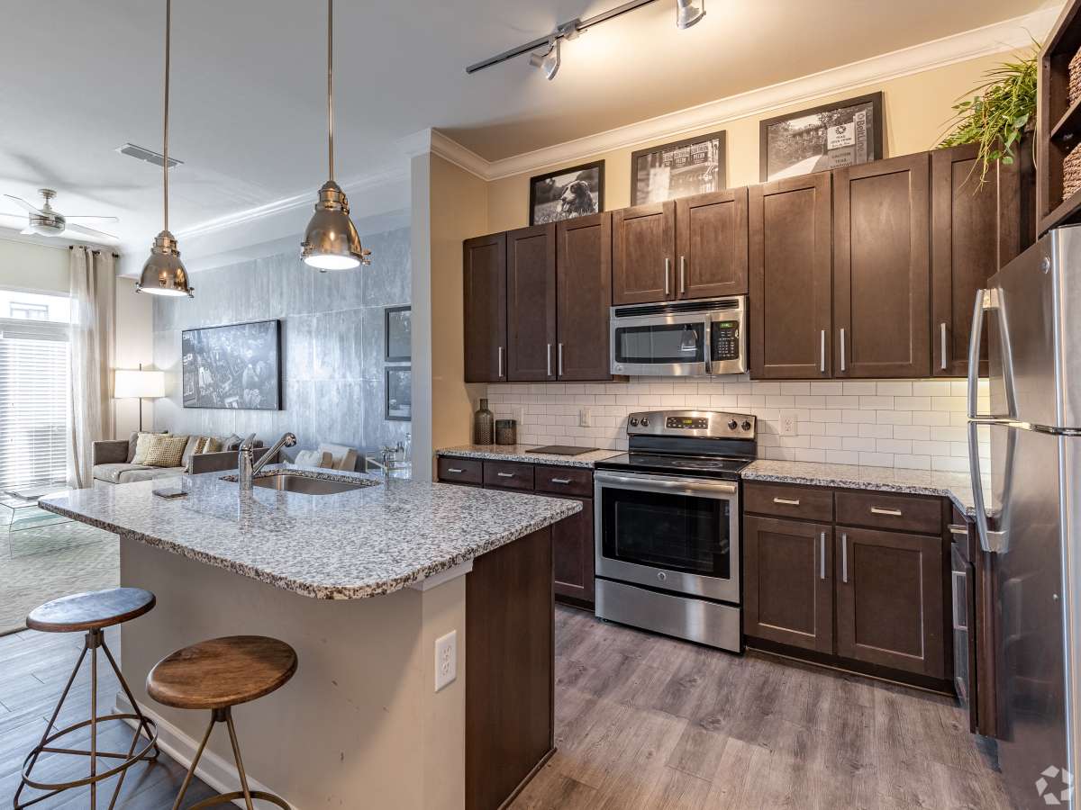 Granite countertop with modern bar stools at Ardmore & Twenty Eighth in Atlanta, Georgia