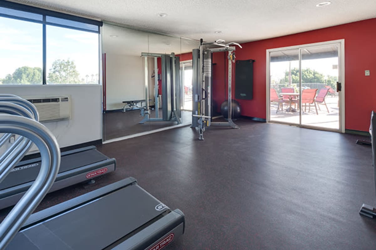 Fitness center with treadmill at Villa Esther, West Hollywood, California