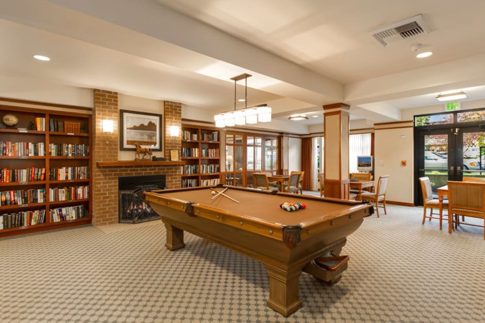 Resident game room at Merrill Gardens at The University in Seattle, Washington. 