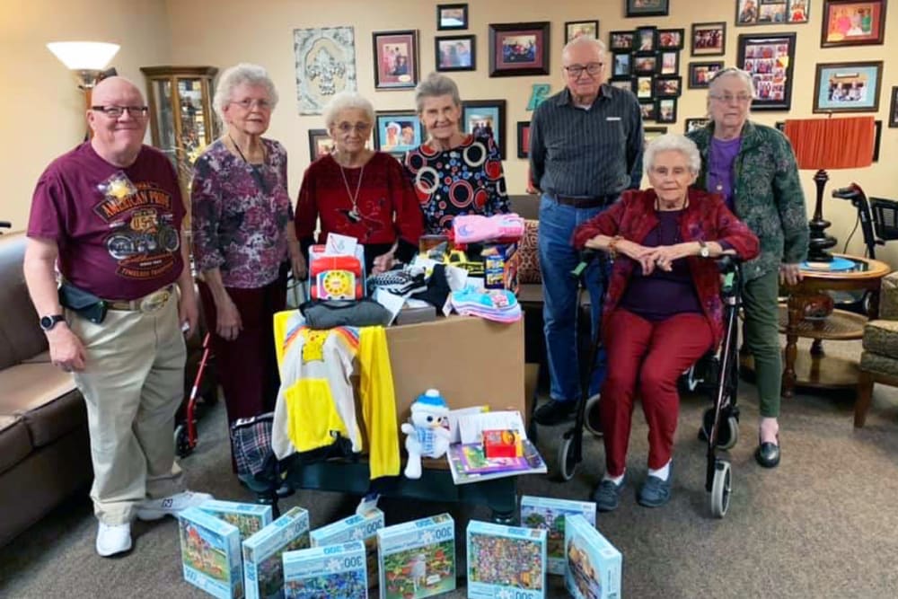 A group of residents working on a community project at Peachtree Village Retirement Community in Roswell, New Mexico. 