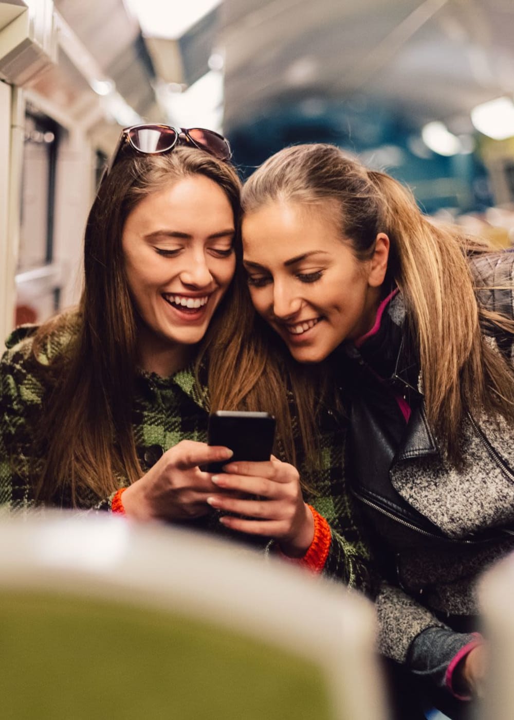 Residents scrolling their phone near at Copper Mill in Austin, Texas