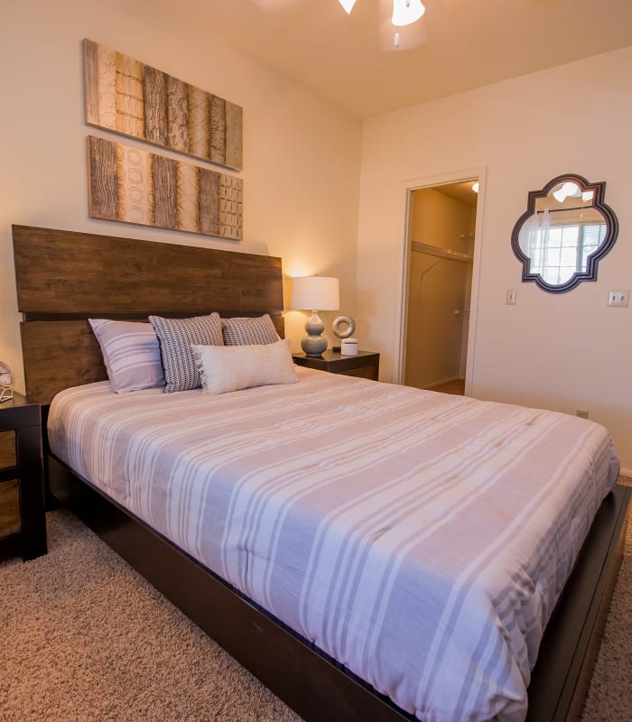 Spacious carpeted bedroom at The Courtyards in Tulsa, Oklahoma