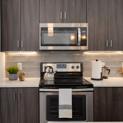 High-end kitchen with stainless-steel appliances at West 38 in Wheat Ridge, Colorado