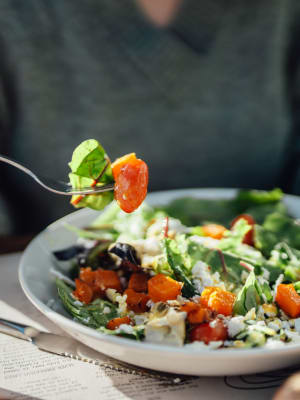 Eating a salad at Redbud Ranch Apartments in Broken Arrow, Oklahoma