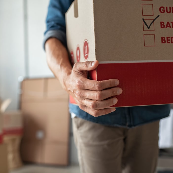 Man carrying box to YourSpace Storage @ Nottingham in Nottingham, Maryland