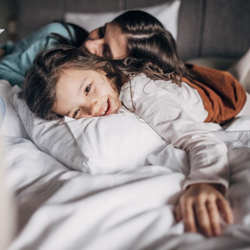 Mother and child snuggling at La Provence in Sacramento, California