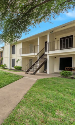 Entryway and stairs at Stonegate Apartments in Mckinney, Texas