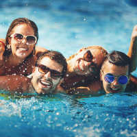 Residents chilling the pool at Niner Woods in Charlotte, North Carolina