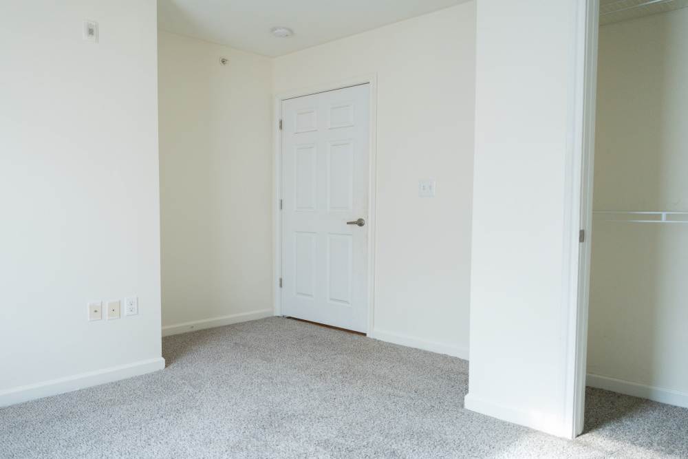 Unfurnished bedroom with carpet flooring at Fairway Breeze in El Reno. OK