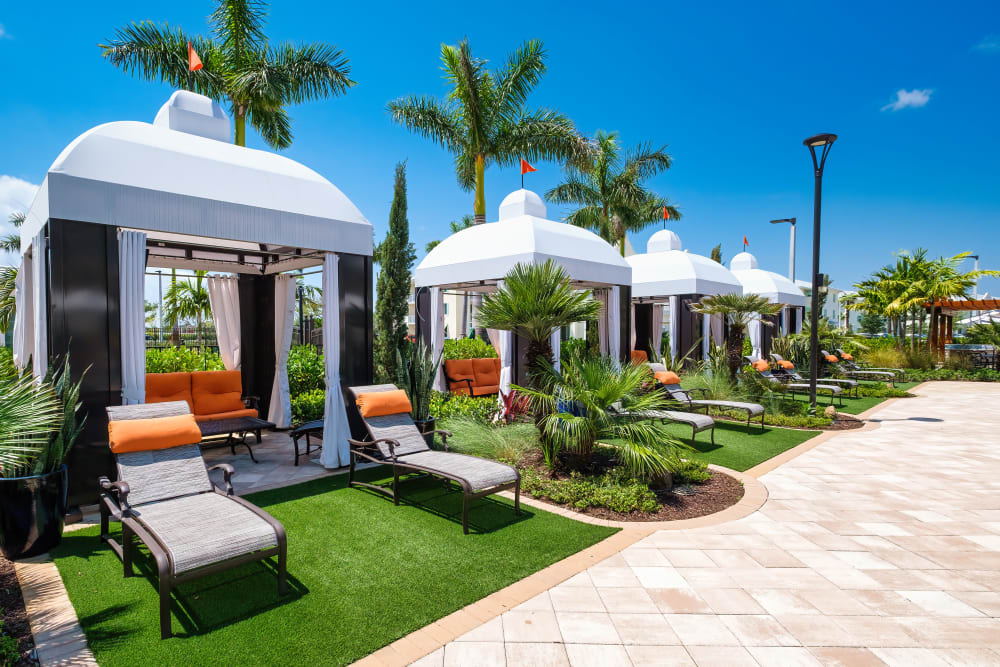 Poolside cabanas at Oceanside Lantana in Lantana, Florida