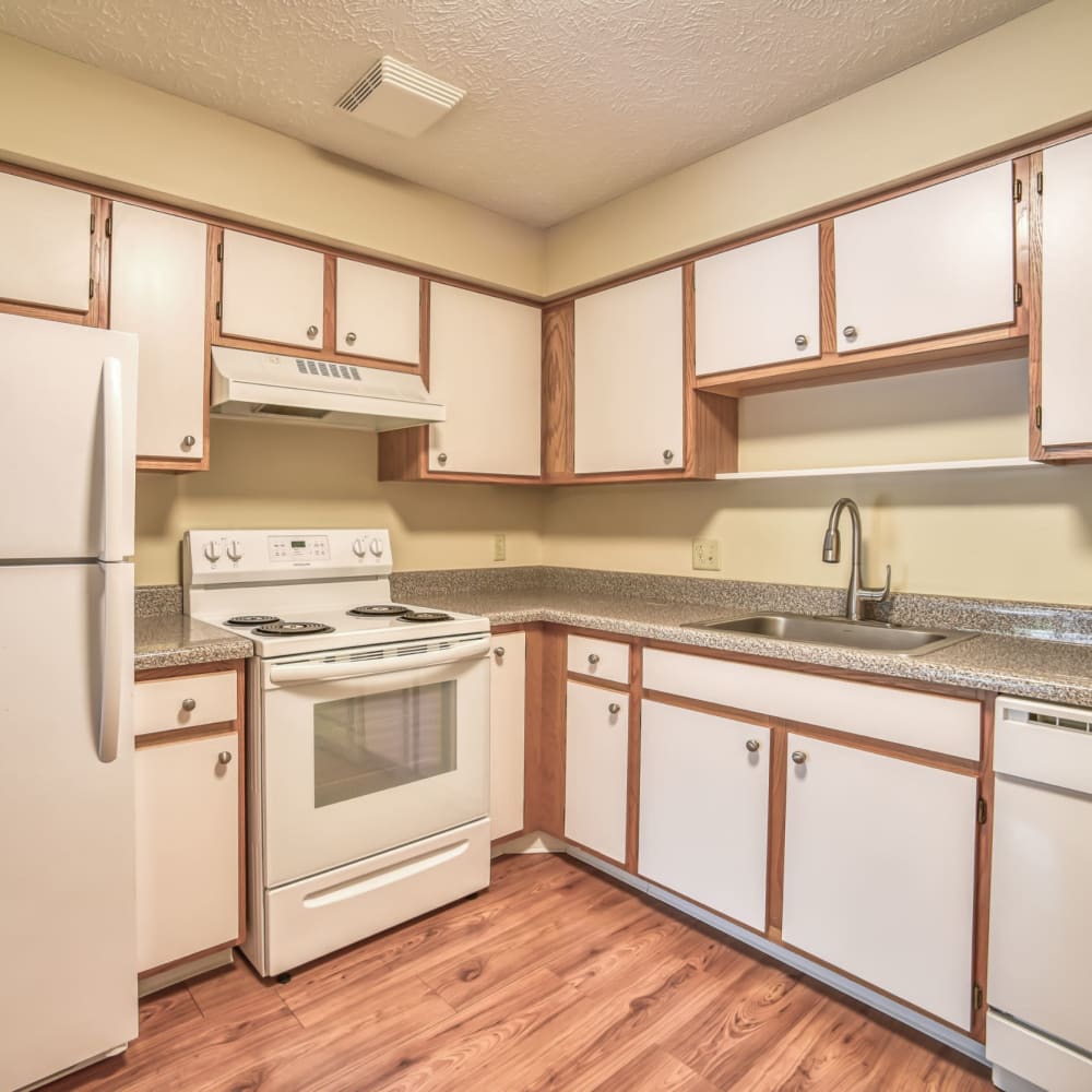 Kitchen with wood-style flooring at Pebble Creek, Twinsburg, Ohio