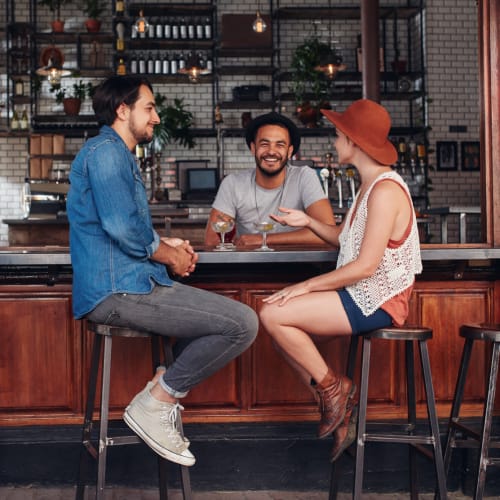 Friends meet for a drink near Aster, Long Beach, California