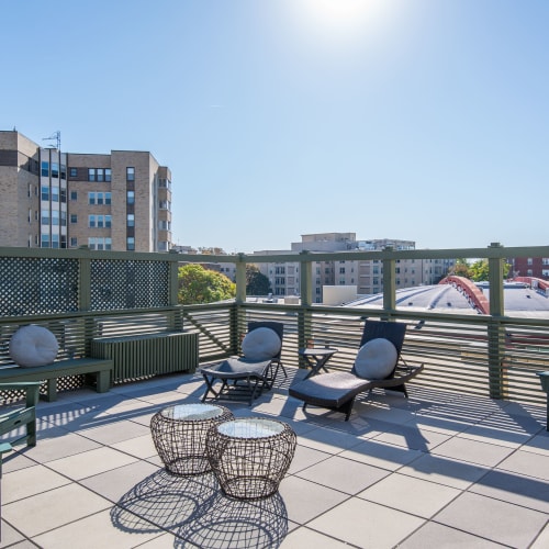 Beautiful rooftop terrace for residents to relax and enjoy the sun on a warm day at Dorchester West in Washington, District of Columbia