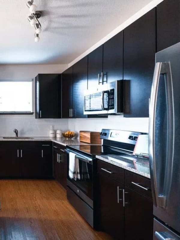 Kitchen with stainless-steel appliances at Velo Verdae, Greenville, South Carolina