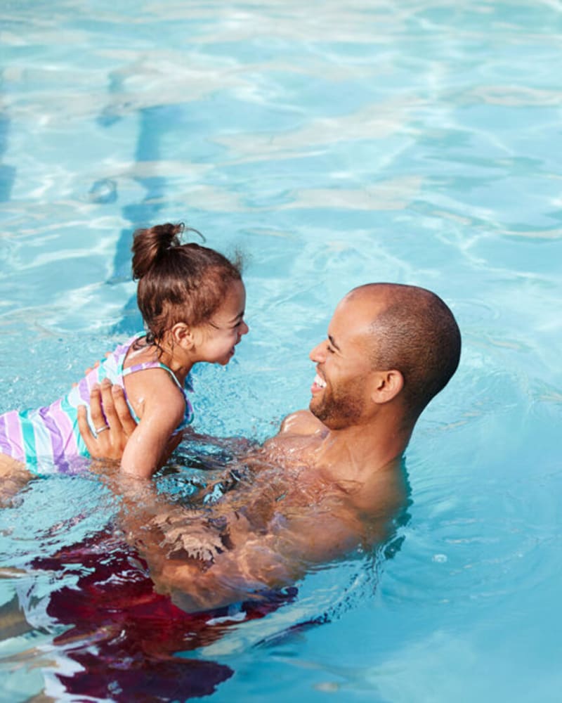 Residents swimming in the pool at Broadstone Villas in Folsom, California