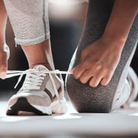 Resident tying her sneakers to go run at Lafayette Oaks in Lafayette, California