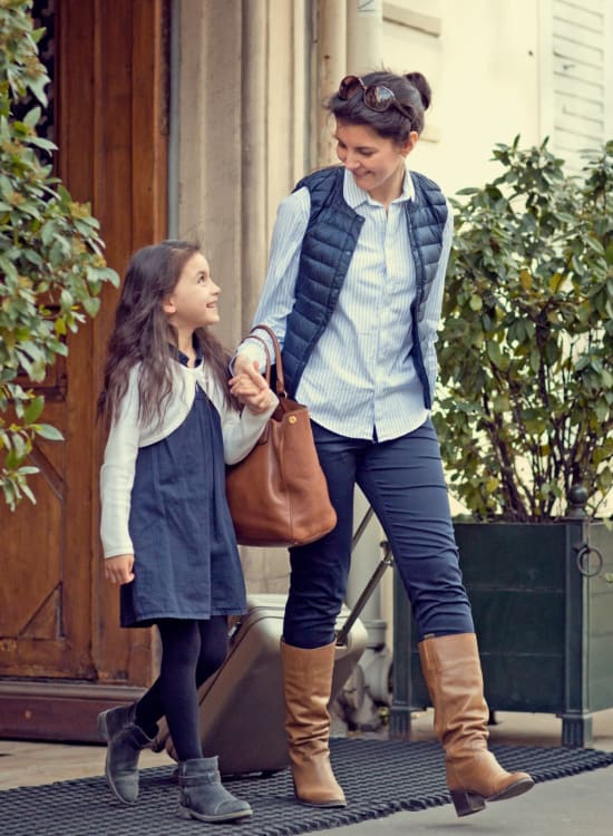 Mother taking her daughter to school in the neighborhood nearby at Solaire 1150 Ripley in Silver Spring, Maryland