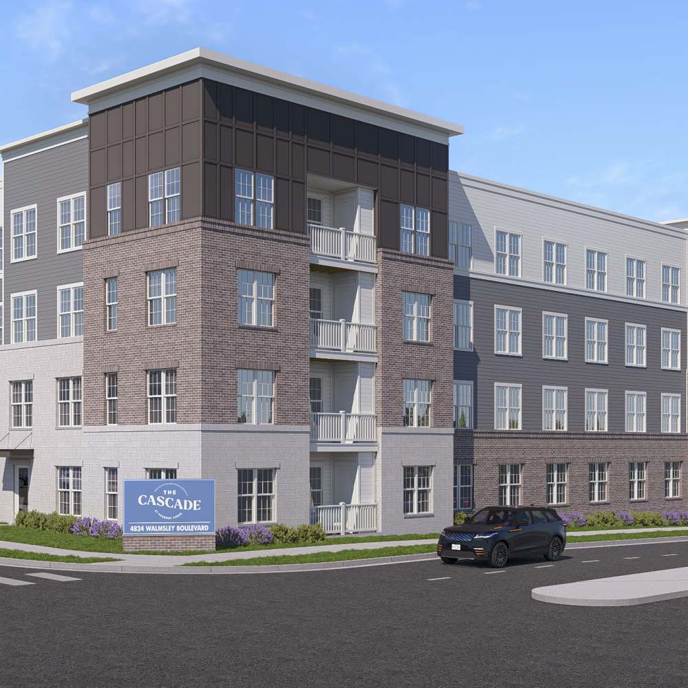 Exterior view of community apartment with signage at The Cascade at Foundry Creek in Richmond, Virginia