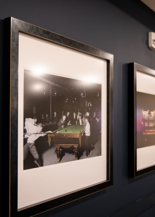 Framed photos on the wall at The Pillars of Lakeville in Lakeville, Minnesota