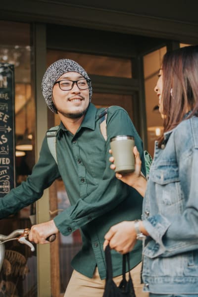 Residents enjoy coffee near Willow Creek, San Jose, California