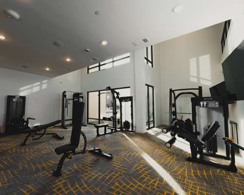 Well-equipped fitness center at Arden at Midtown GP in Grand Prairie, Texas