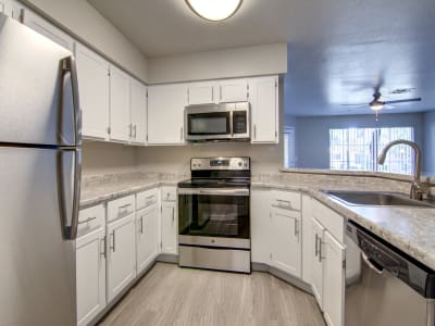 Modern kitchen with stainless-steel appliances at The Boulevard in Phoenix, Arizona