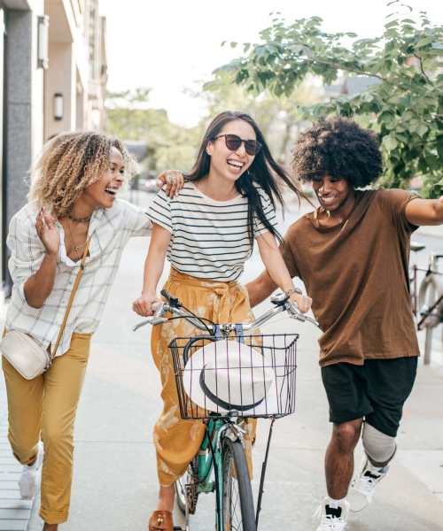 Friends enjoying a sunny day near Crescent Place in Savannah, Georgia