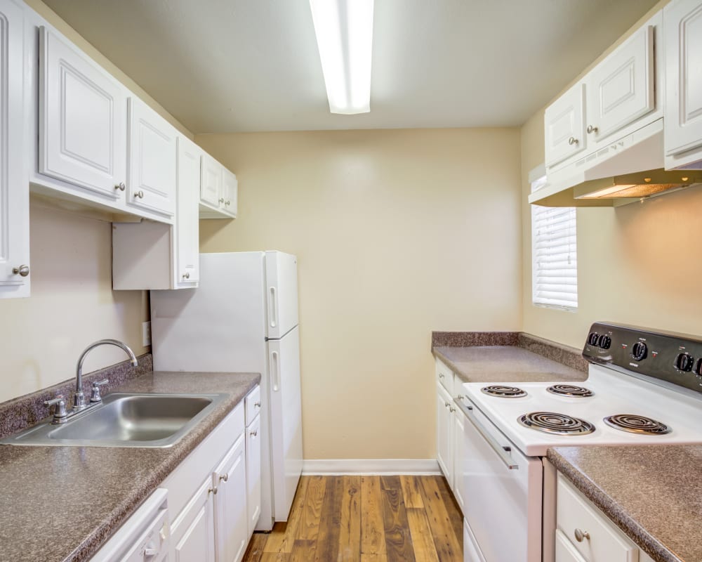 Model kitchen at Woodcreek Apartments in Huntsville, Texas