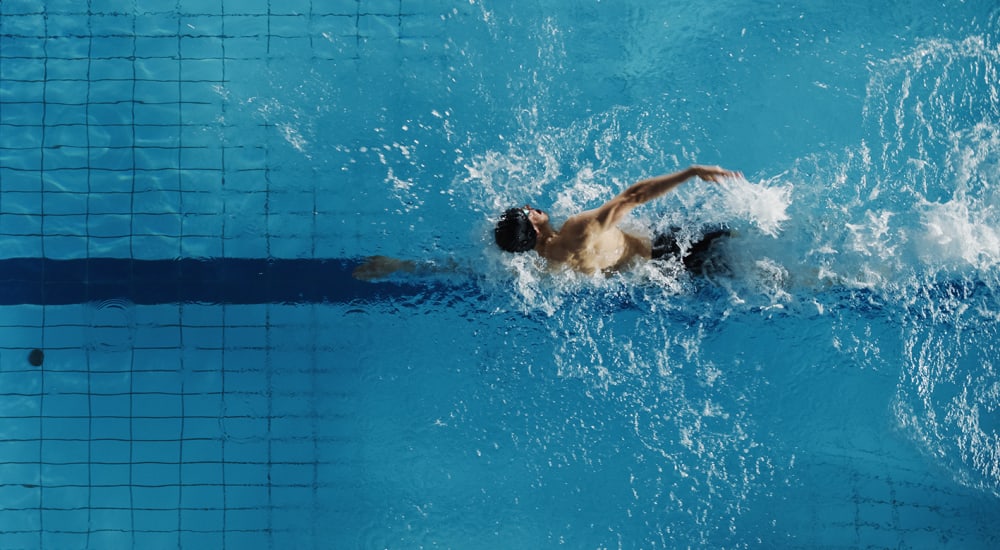 Resident swimming at Xenia Apartments in Golden Valley, Minnesota