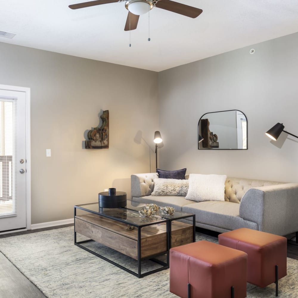 Updated living room with hardwood floors at Springhill Apartments in Overland Park, Kansas