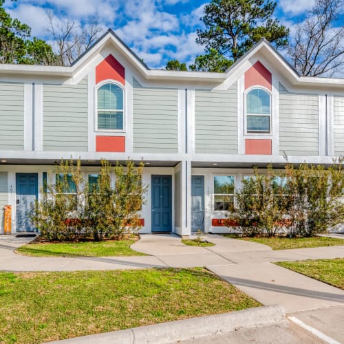 Landscaping outside homes at Huntsville Village Apartments in Huntsville, Texas