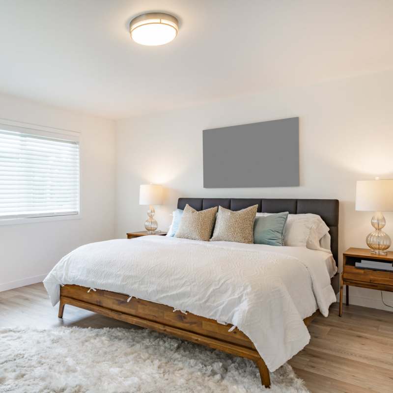 Spacious bedroom with a bed at Hubbards Ridge in Garland, Texas