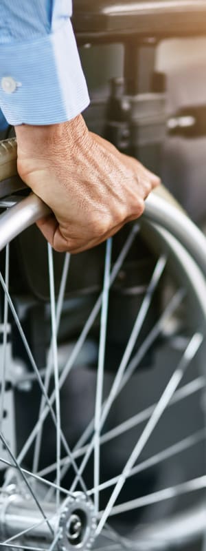 Resident in wheelchair at The Residences at Miami, Miami, FL