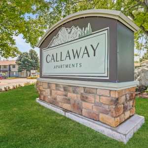Exterior of the property and signage at Callaway Apartments in Taylorsville, Utah